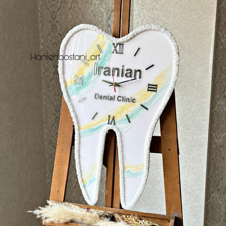 ساعت دیواری رزینی طرح دندان برای دندانپزشک ها
